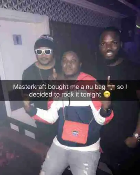 Fans React As Rapper CDQ Rocks 'Female Bag' Bought For Him By Masterkraft (Photo)